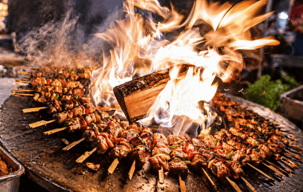 BBQ showcooking Ofyr met kip piri piri spiezen live bereid door de chef van CaterEvents